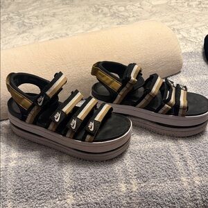 Nike Black and Gold Platform Sandals